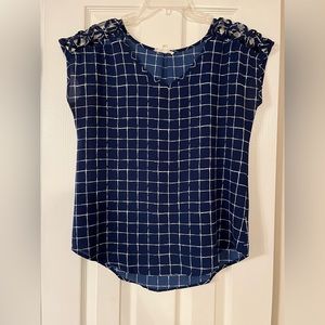Blue patterened blouse with nice detail on shoulders , silky and soft. Size M